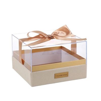 Papieren cadeaubon met lint, aangepast acryldoek, deksel, doorzichtige chocolade doos