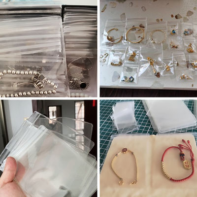 Kleine sieradenzakjes met aangepast logo Dikke heldere plastic oorbellen
